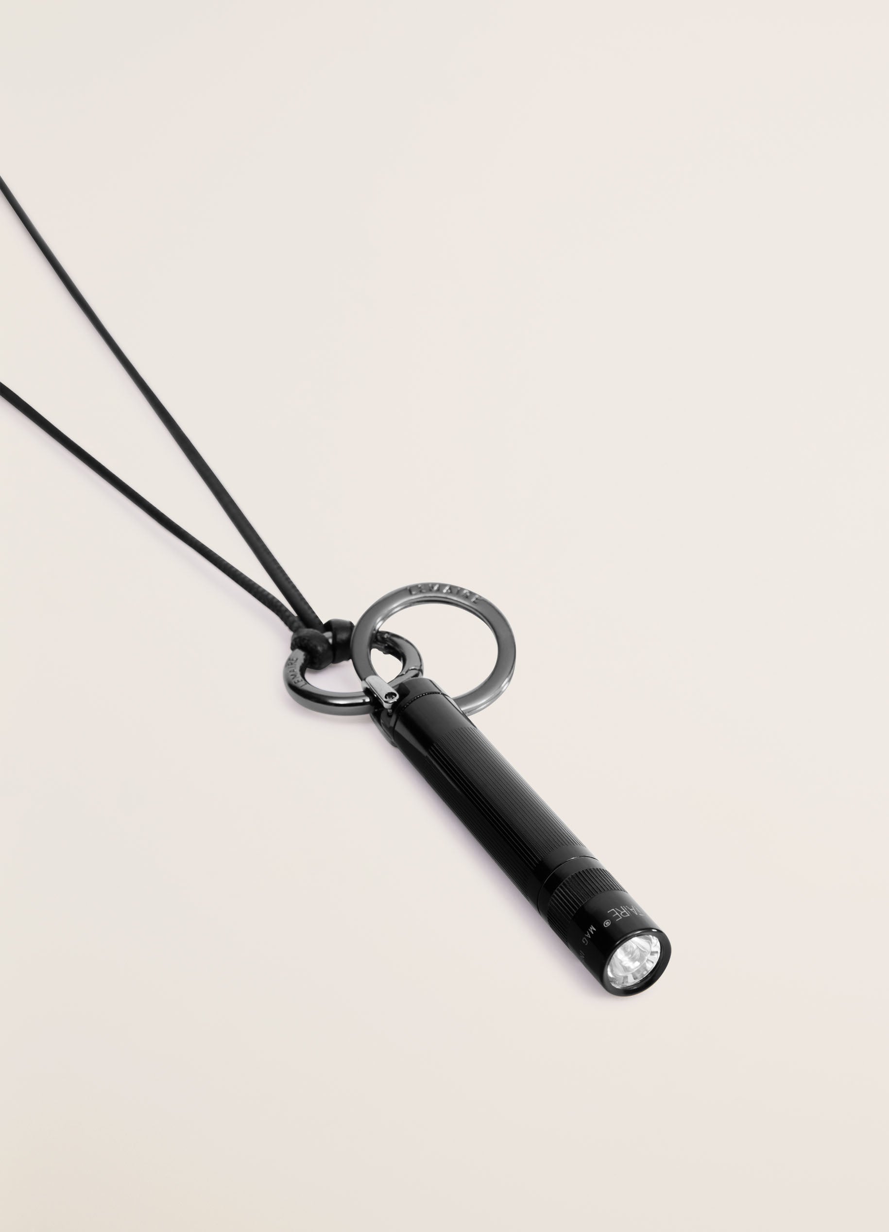 Flat inox and leather ring pendant with cotton cord